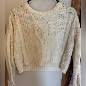White/ cream sweater. Slightly cropped, size small.